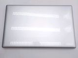a close up of a white laptop with a lot of dots on it