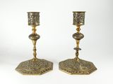pair of antique brass candlesticks with floral design