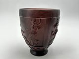an image of a brown bowl with a design on it