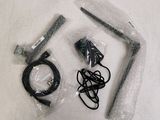 the contents of a nintendo wii game system are wrapped in plastic