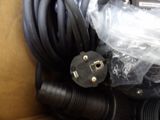 a box with a bunch of electrical cords and wires in it