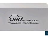 a white box with a logo on it that says automobile
