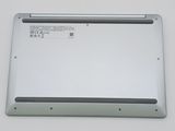 the back of a laptop computer with a white back panel