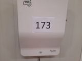 a paper towel dispenser attached to the wall