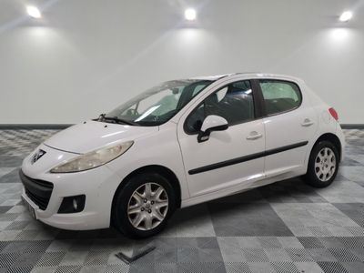 a picture of a white car parked in a garage