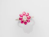 a ruby and diamond cluster ring