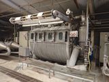 a large machine that is sitting inside of a building
