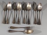 six spoons and six forks arranged in a row