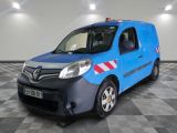 a picture of a blue van parked in a garage