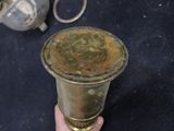 a person holding a glass of water in their hand