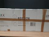a cardboard box sitting on top of a wooden table