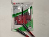 three pens and a pair of scissors on a table