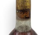 a bottle of wine that is sitting on a table