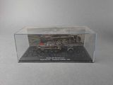 a display case with a model of a tank in it