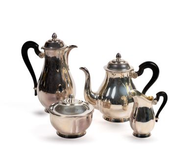 three pieces of silver tea and coffee set on a white background