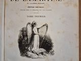 an old book with a drawing of an angel holding a harp