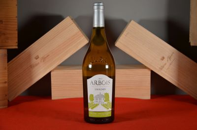 a bottle of wine that is sitting on a table