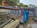 a large pile of metal and wood in a yard