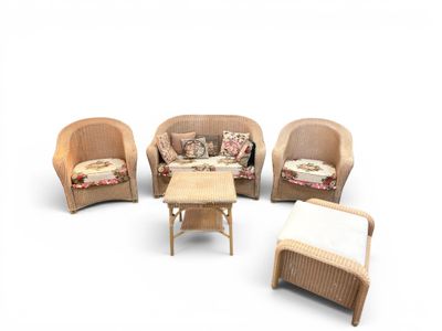 a group of chairs and a table in a room