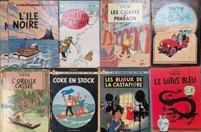 several children ' s books are lined up on a table