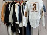 a rack full of clothes with a number on it
