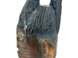 an image of a statue of a woman ' s head on a white background