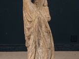 statue of a woman holding a child in her arms