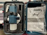 a blue case with an electronic device inside of it