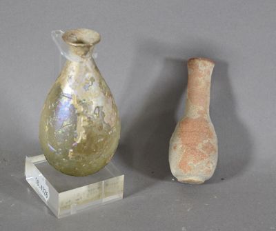 two vases sitting next to each other on a table