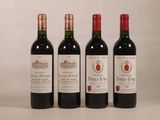 trois bouteilles de vin rouge sont alignées sur une table