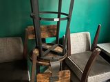 a chair that is sitting in front of a couch