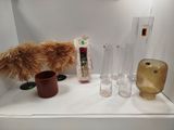 many different vases and vases on a shelf