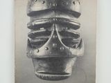 an old photo of a book with a helmet on it