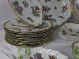 a lot of plates that are sitting on a table