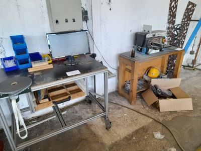 a workbench in a garage with a lot of tools