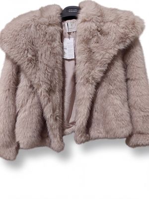 a close up of a jacket on a hanger on a white background