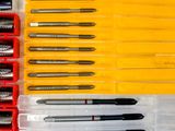 many different types of screws in a plastic box