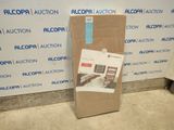 a cardboard box sitting on the floor in front of a wall