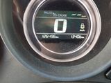 a close up of a car dashboard with a clock on it