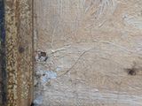 a close up of a piece of wood on the wall
