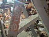 a picture of a ladder in a building with a sign on it