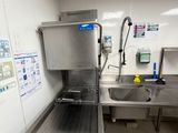 an image of a commercial kitchen with stainless steel appliances