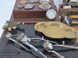 a lot of antique items that are on a table