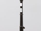 side view of a lamp post showing the base of the lamp