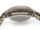 an image of a close up of a watch on a white surface