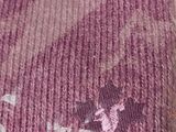 purple and white knitted blanket with a picture of a cat on it