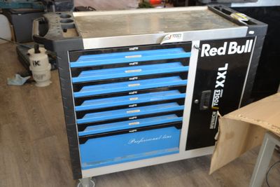 an image of a blue tool cabinet in a workshop