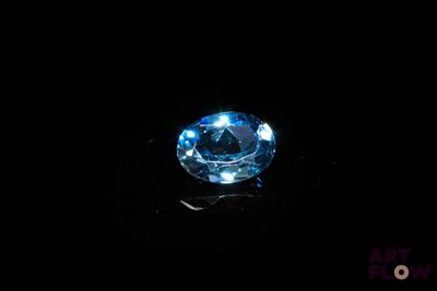 an image of a blue diamond on a black surface