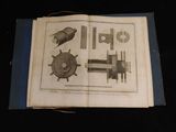 un livre ouvert sur lequel figurent des dessins représentant divers objets