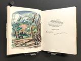 an open book with a picture of a person riding a bike